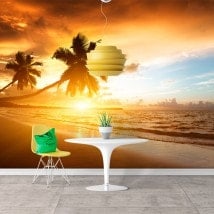 Foto muro murales tramonto palme sulla spiaggia