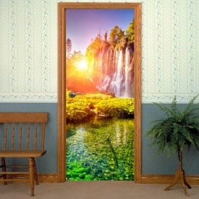 Porte in vinile decorative tramonto nelle cascate